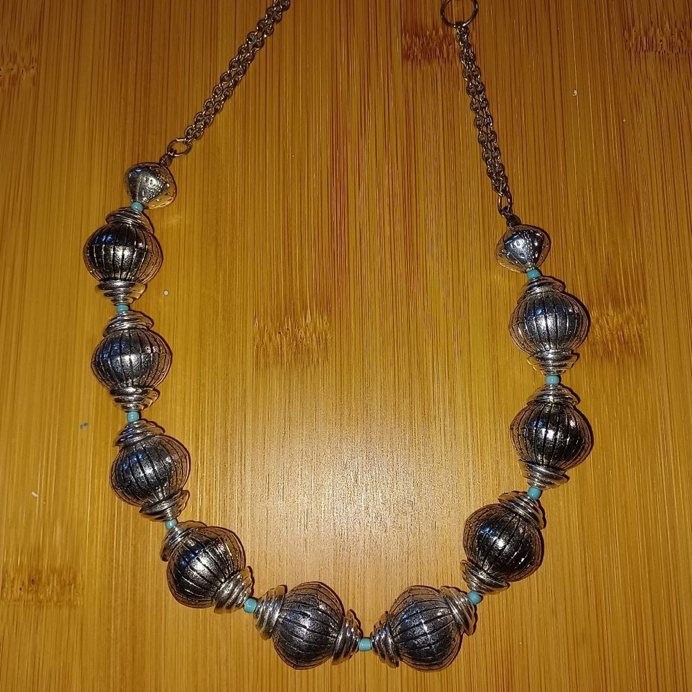 Grayish, metal-like beaded necklace